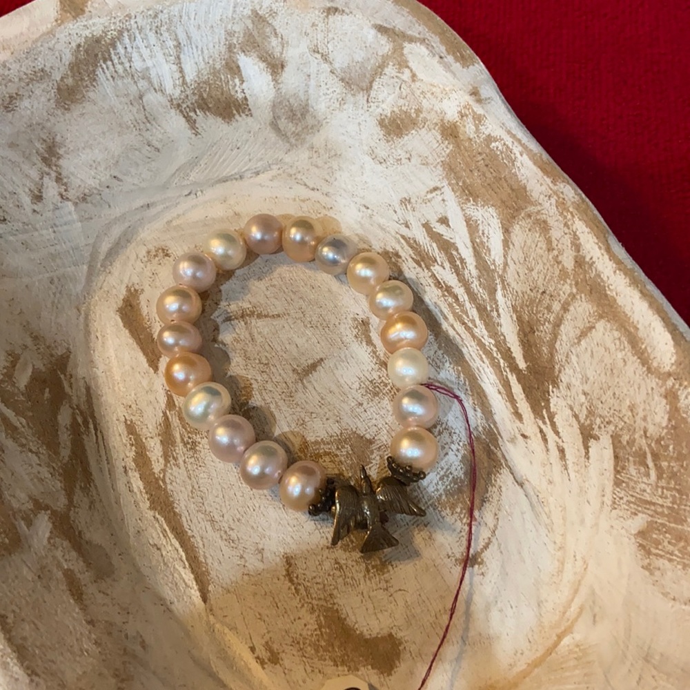 Pearl bracelet with Holy Spirit medal